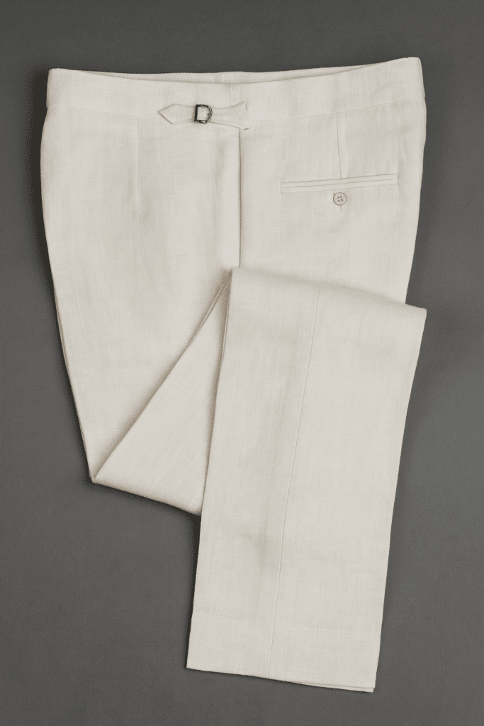 tailored white linen trousers with side buckles